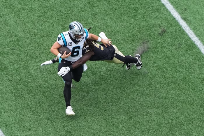Carolina Panthers quarterback Baker Mayfield (6) is sacked by New Orleans Saints linebacker Demario Davis (56). Mandatory Credit: Bob Donnan-USA TODAY Sports
